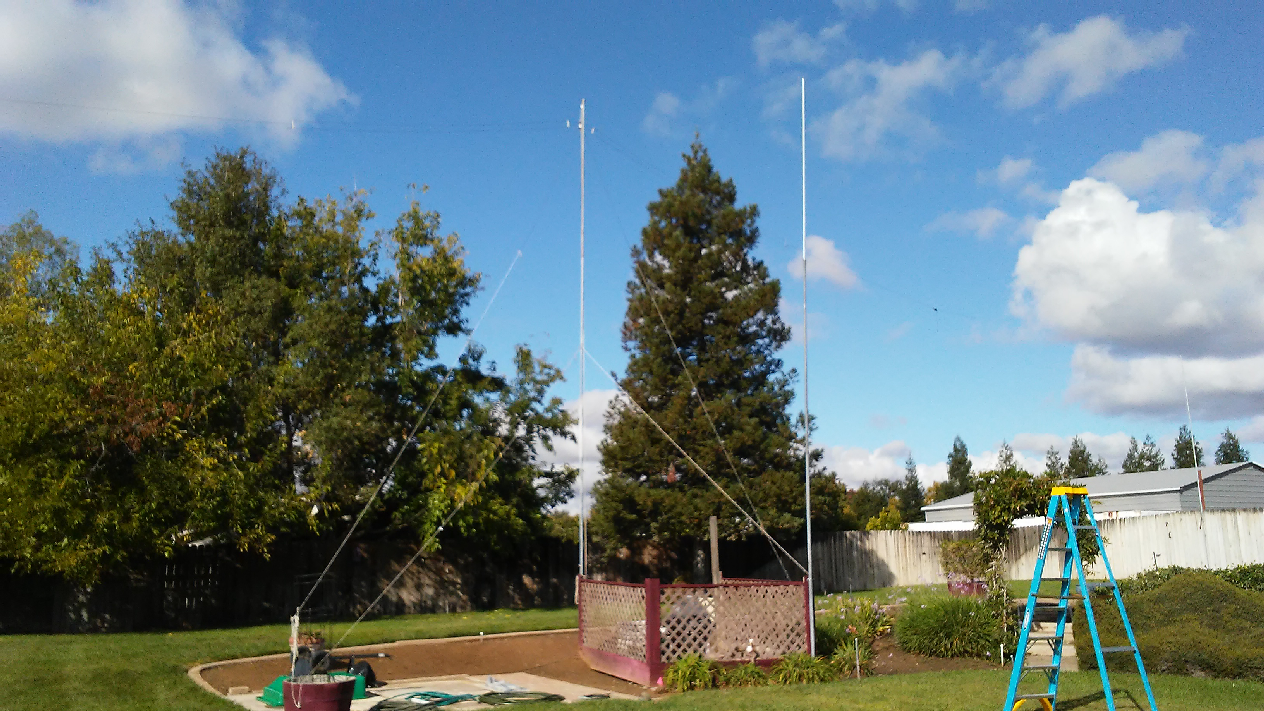 ham radio EMT conduit-chan link fence top rail antenna mast